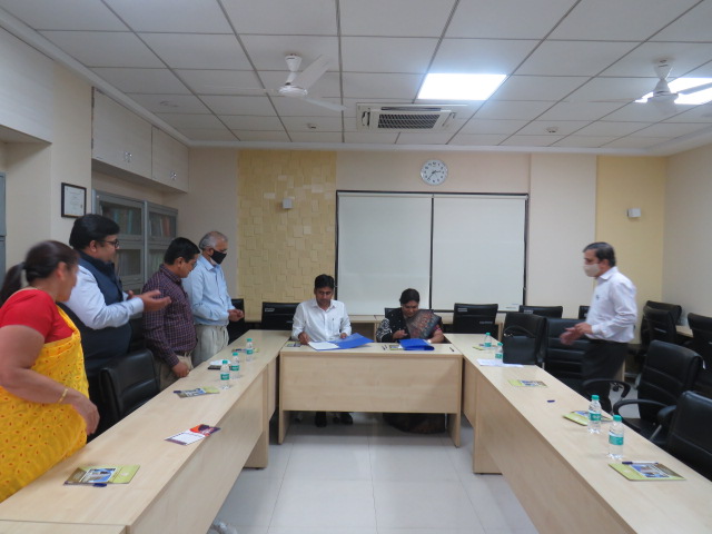 HOD Dept.of Accountancy and CMA officilas signing the MOU