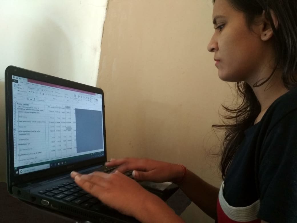 Intern Chitra while at work