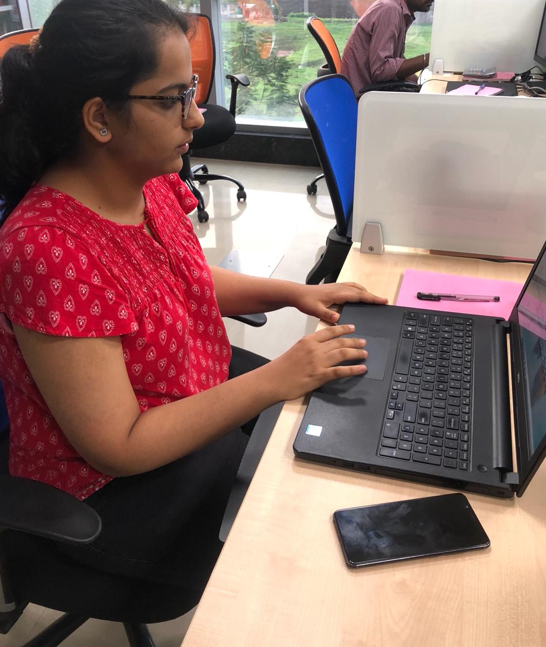 Intern Divya while at work